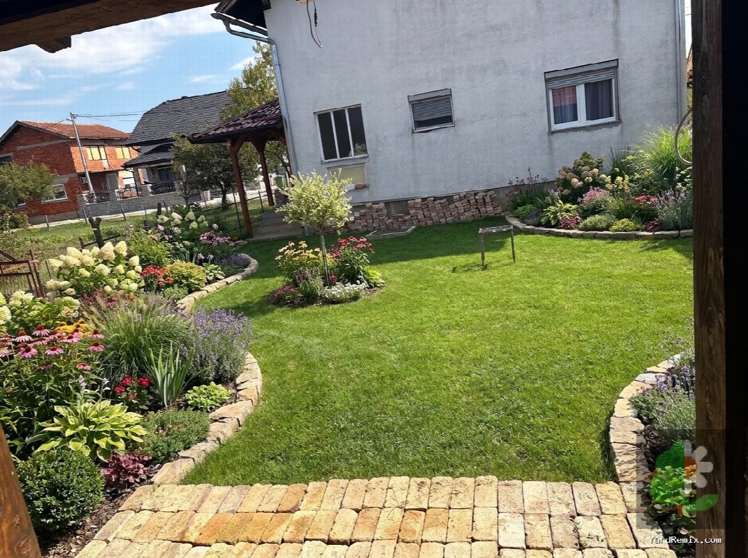 After: the yard remixed into Lush Garden Beds by YardRemix AI