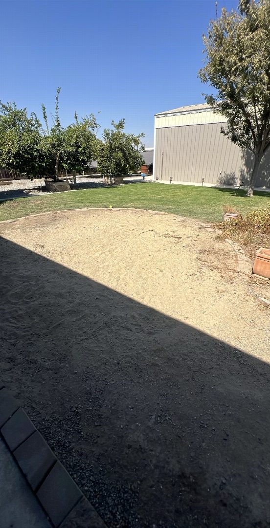 Before: the original yard photo