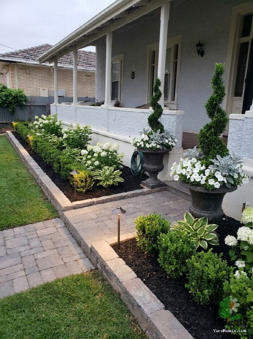 After: the yard remixed into Professional Curb Appeal by YardRemix AI