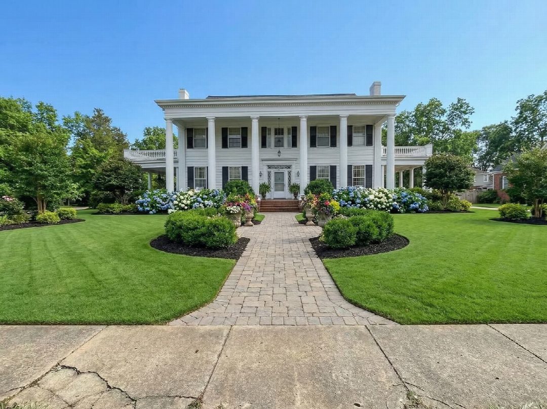 After: the yard remixed into Professional Curb Appeal by YardRemix AI